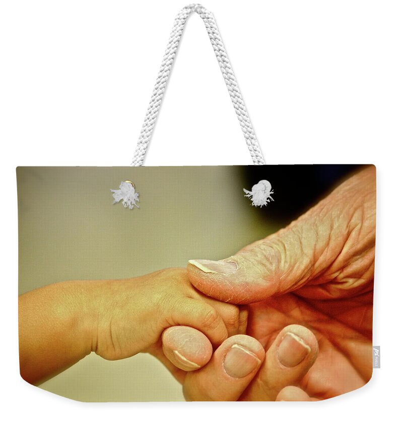 Hands Weekender Tote Bag featuring the photograph New And Old by Diana Hatcher