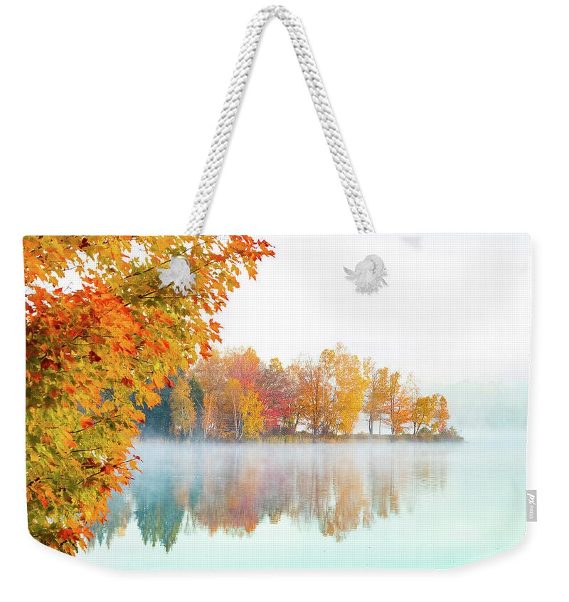 Haley Pond Weekender Tote Bag featuring the photograph New England fall colors of Maine by Jeff Folger