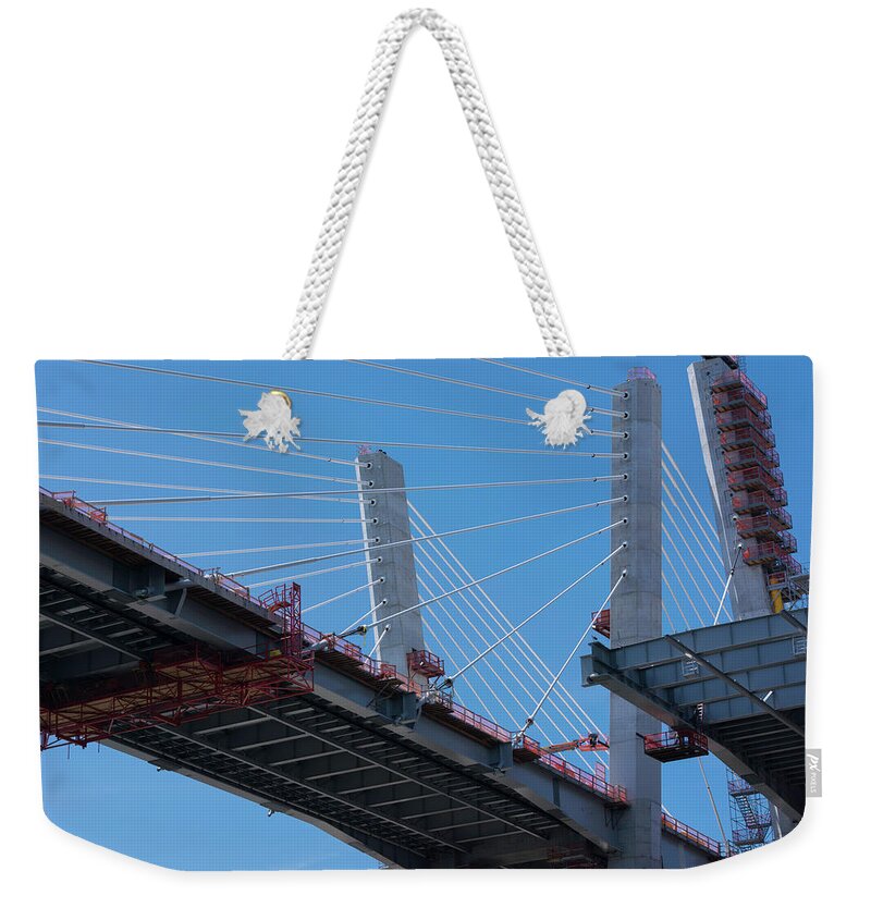 Goethals Bridge Weekender Tote Bag featuring the photograph New Goethals Bridge Construction 1 by Kenneth Cole
