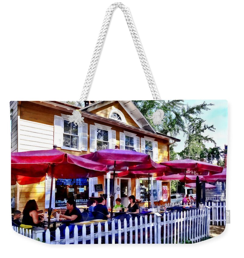 New Hope Weekender Tote Bag featuring the photograph New Hope PA - Dining Al Fresco by Susan Savad