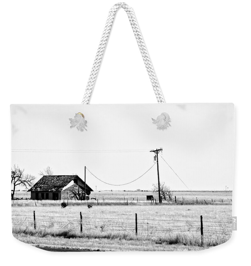 New Mexico Weekender Tote Bag featuring the photograph New Mexico Roadside by Lars Lentz