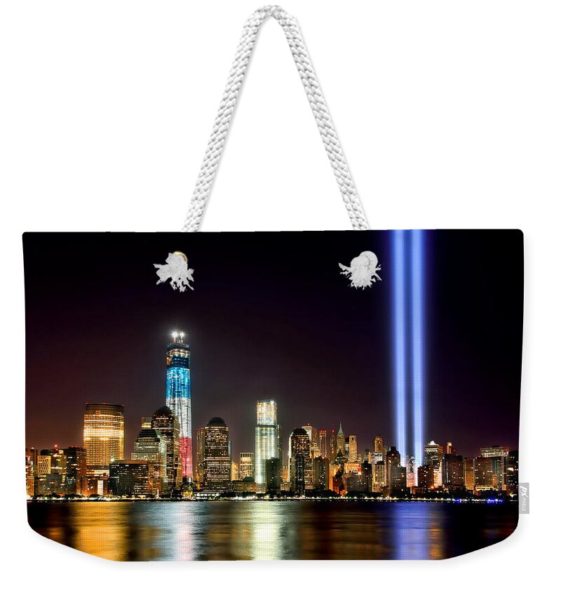 New York City Skyline At Night Weekender Tote Bag featuring the photograph New York City Skyline Tribute in Lights and Lower Manhattan at Night NYC by Jon Holiday