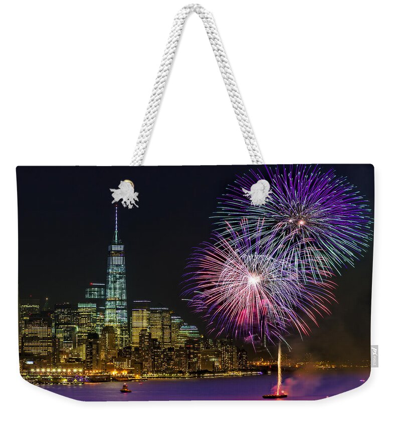 Fireworks Weekender Tote Bag featuring the photograph New York City Summer Fireworks by Susan Candelario