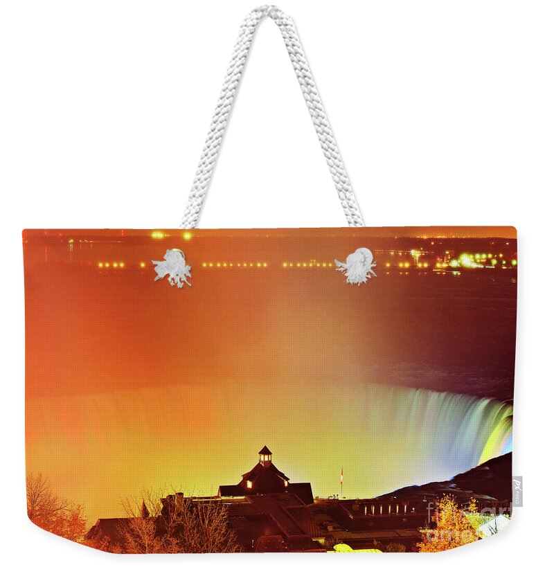 Niagara Falls Weekender Tote Bag featuring the photograph Niagara Falls Illumination Light Show by Charline Xia