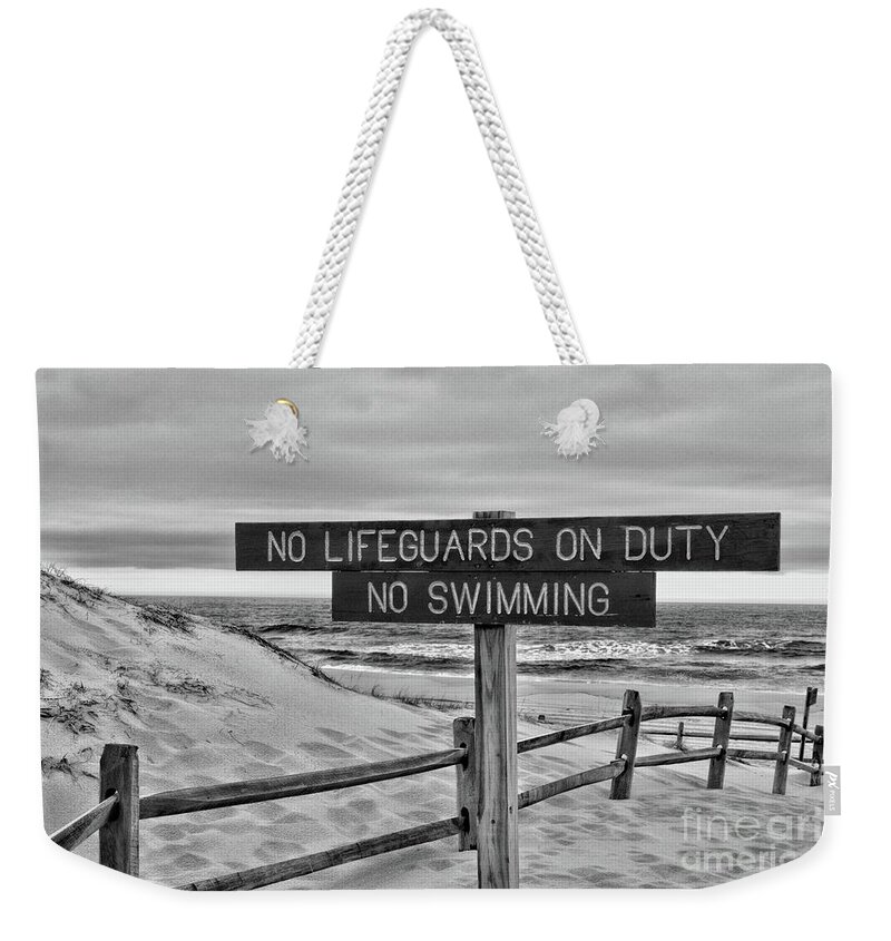 Paul Ward Weekender Tote Bag featuring the photograph No Lifeguards on Duty black and white by Paul Ward
