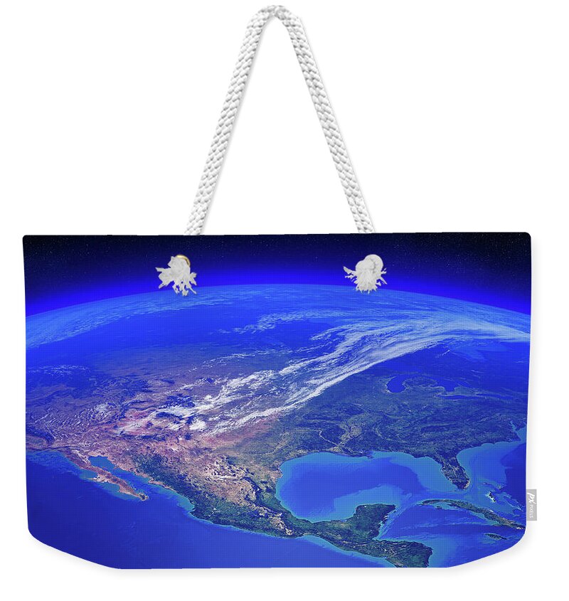 Earth Weekender Tote Bag featuring the photograph North America seen from space by Johan Swanepoel