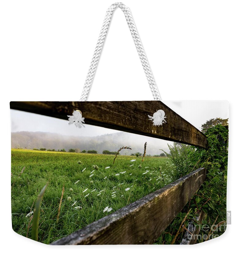 Wooden Weekender Tote Bag featuring the photograph North Road Fence by Jim Gillen