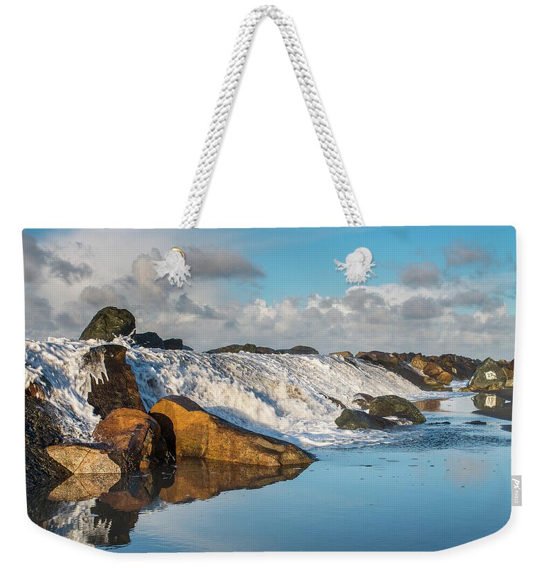 North Jetty Weekender Tote Bag featuring the photograph North Spit Wave Spillover by Greg Nyquist