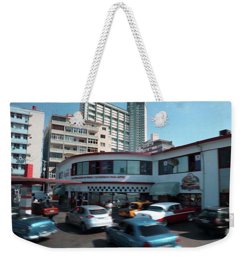 Vintage Weekender Tote Bag featuring the photograph Nostalgia in Motion by Laura Davis