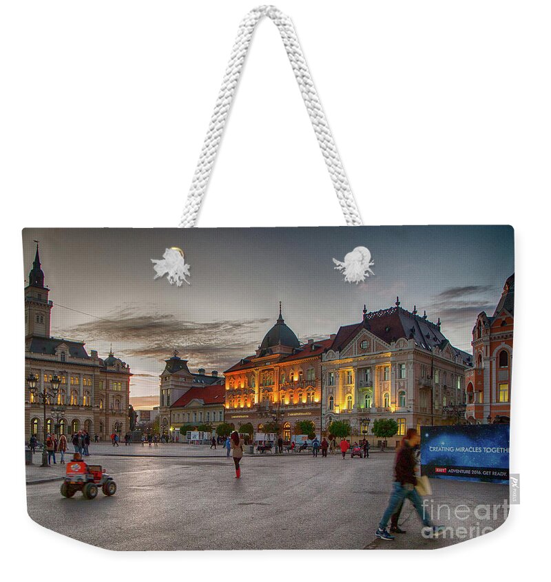 Art Photography Weekender Tote Bag featuring the photograph Novi Sad Liberty Square at twilight by Jivko Nakev