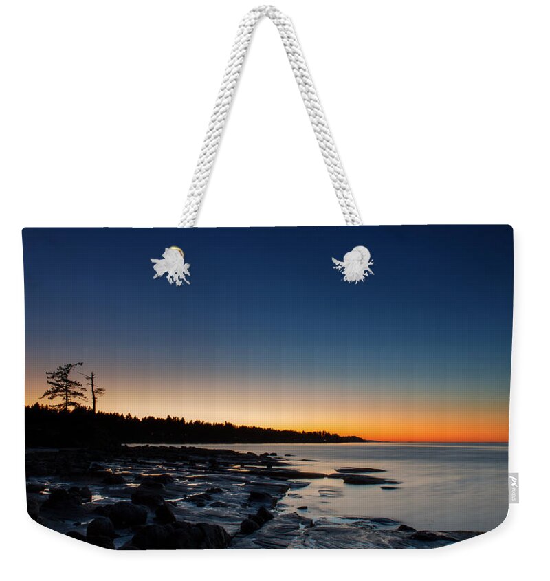 Water Weekender Tote Bag featuring the photograph NW Bay Sunset by Randy Hall