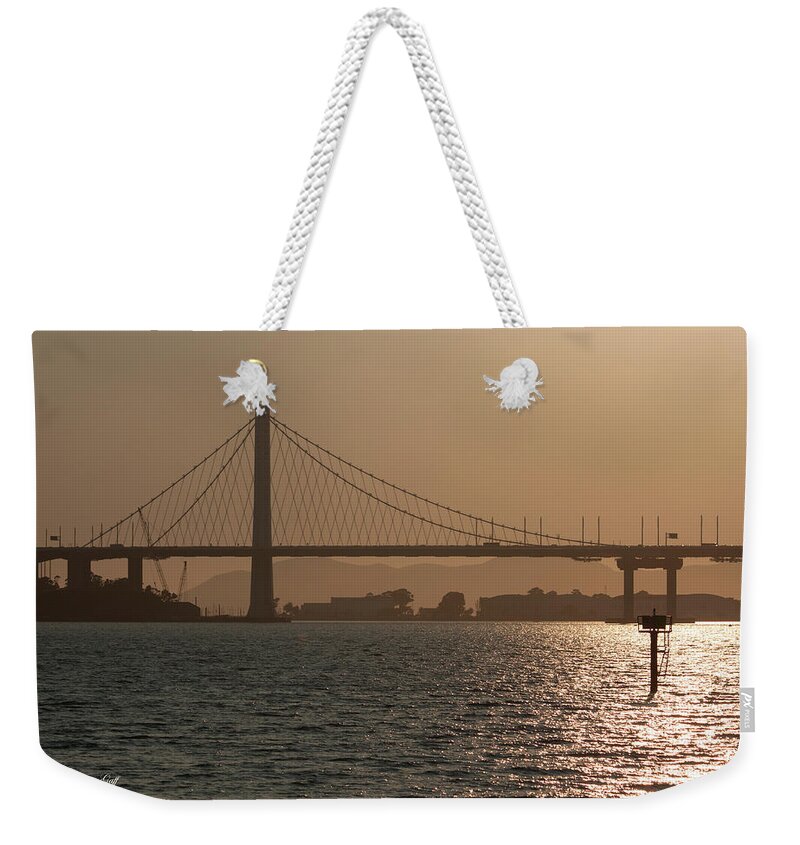 Photograph Weekender Tote Bag featuring the photograph Oakland Bay Bridge by Suzanne Gaff