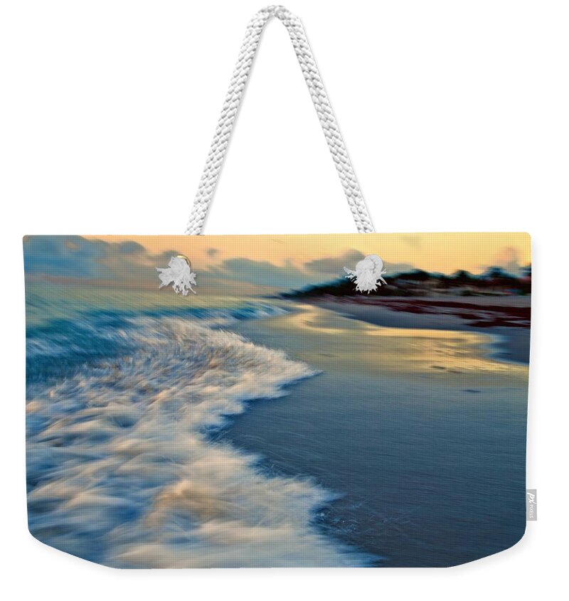 Ocean Weekender Tote Bag featuring the photograph Ocean in motion by Dennis Baswell