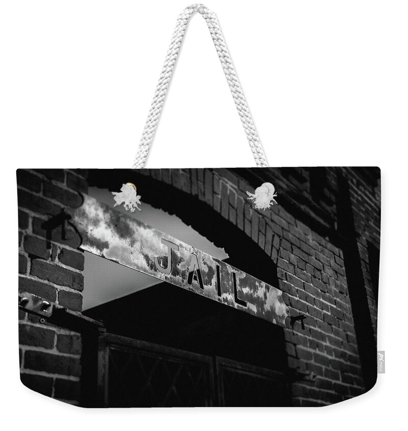 Jail Sign Weekender Tote Bag featuring the photograph Off to Jail by Doug Camara