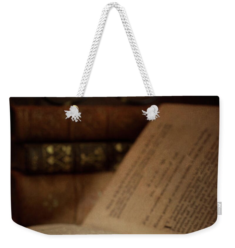 Old Weekender Tote Bag featuring the photograph Old Book With Key by Ethiriel Photography