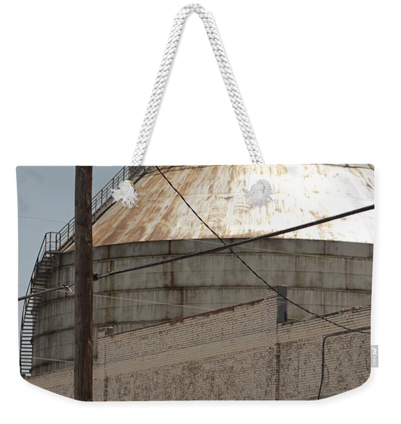 Photograph Weekender Tote Bag featuring the photograph Old Building and Grain Silo by Colleen Cornelius