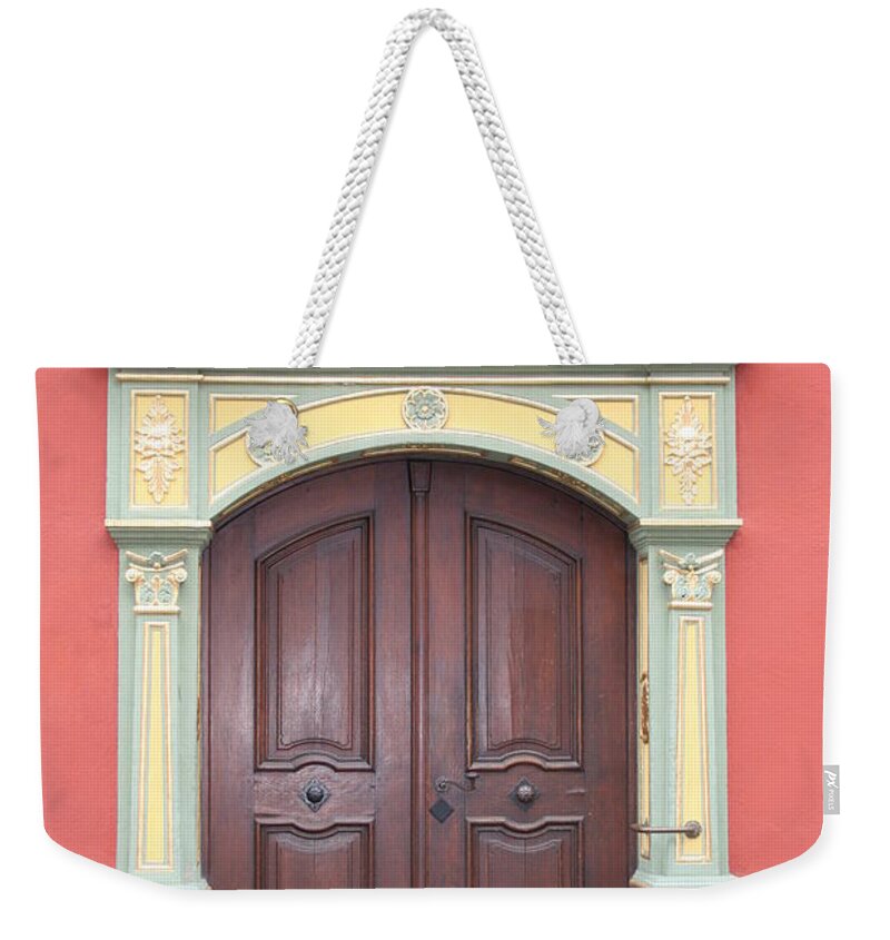 Door Weekender Tote Bag featuring the photograph Old Door And Emblem by Christiane Schulze Art And Photography