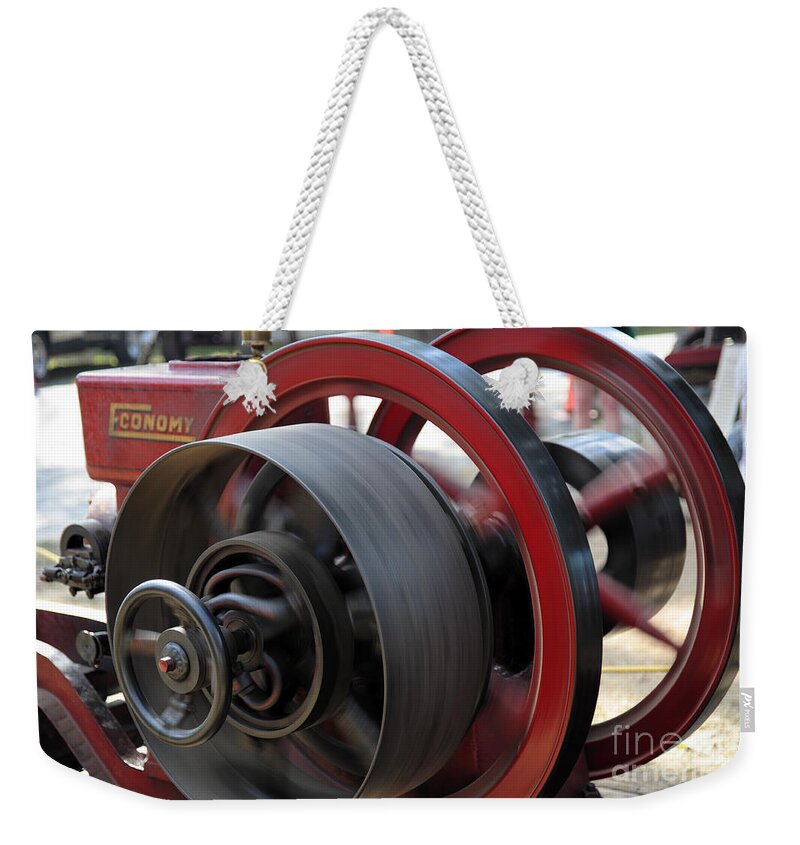 County Fair Weekender Tote Bag featuring the photograph Old Economy Gas Engine on Display at a County Fair by William Kuta