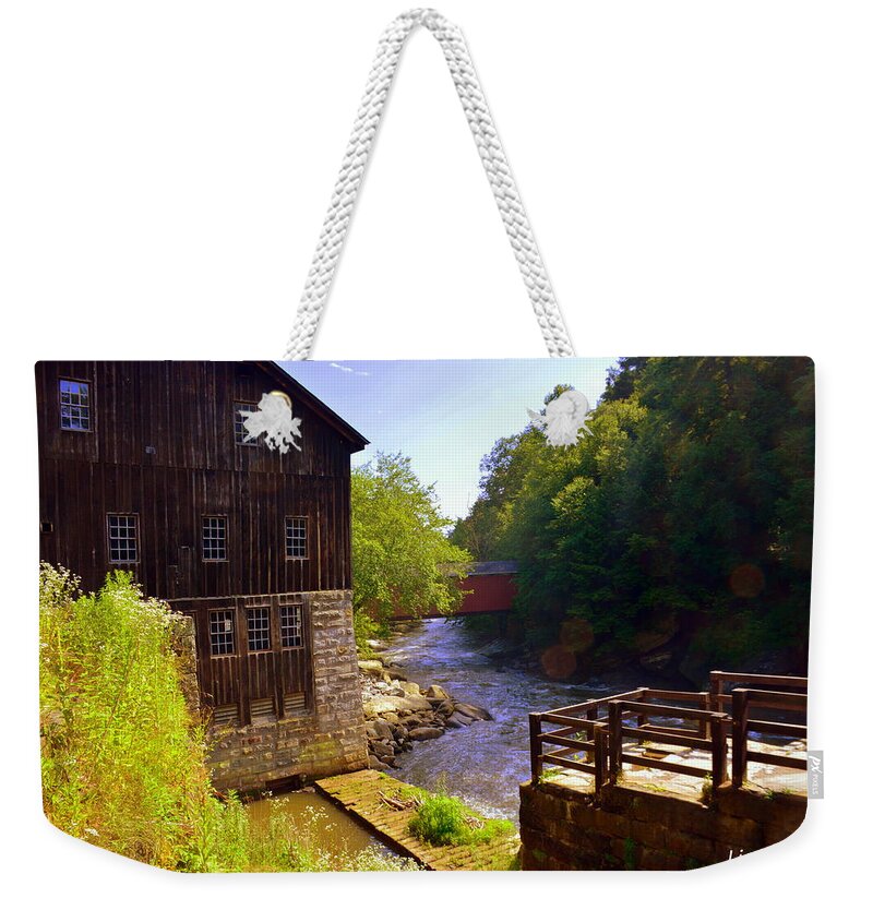 Mcconnells Mill State Park Pa Weekender Tote Bag featuring the photograph Old Mill and Covered Bridge at McConnells Mill State Park PA by Lisa Wooten