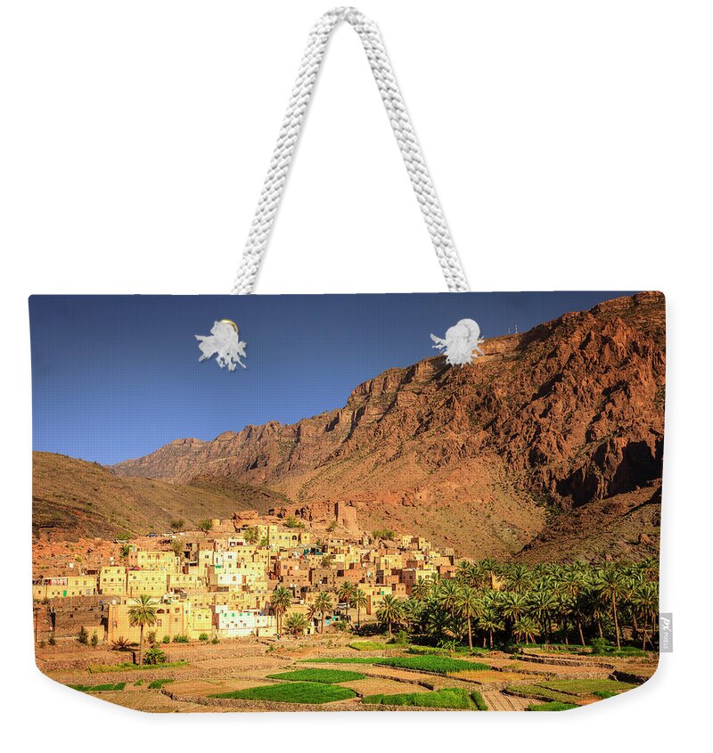 Al Hajar Weekender Tote Bag featuring the photograph Omani village in the mountains by Alexey Stiop