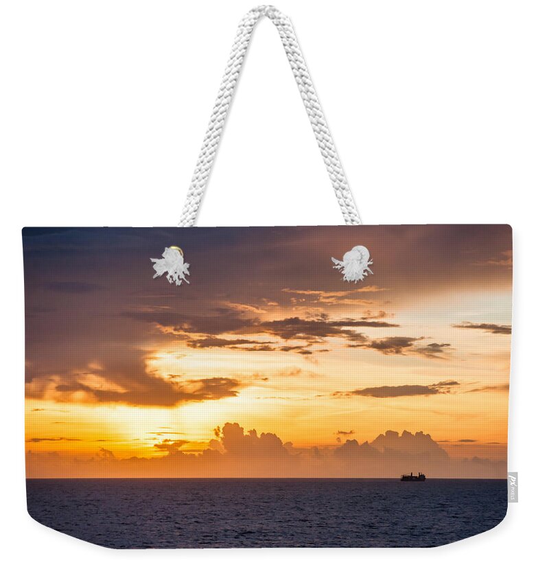 Sunsets Weekender Tote Bag featuring the photograph On my way by Charles McCleanon
