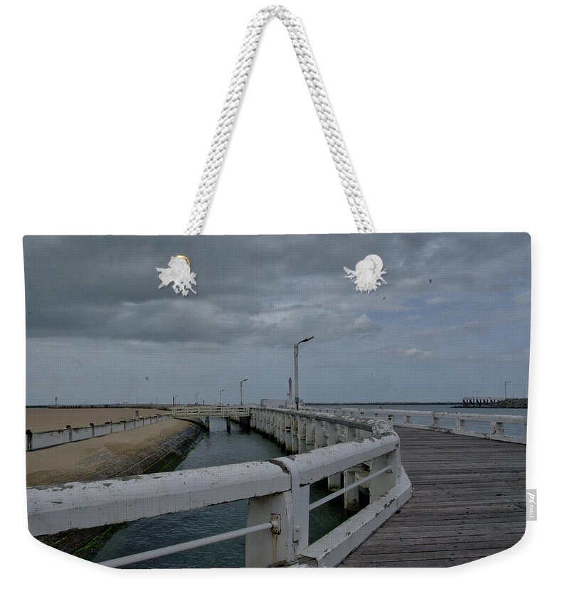 Belgium Weekender Tote Bag featuring the photograph On the boardwalk by Ingrid Dendievel