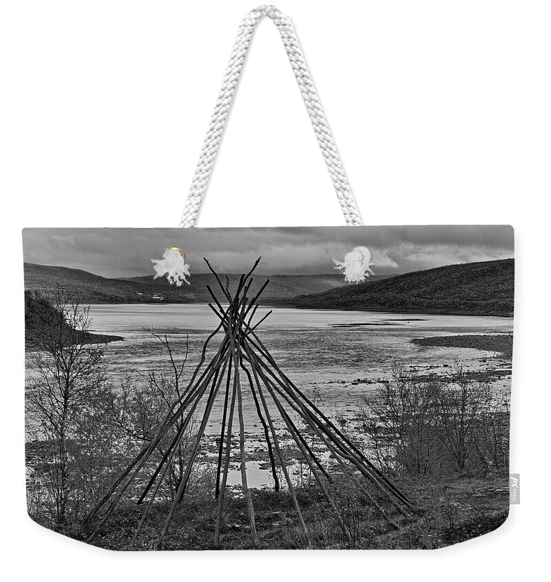 River Weekender Tote Bag featuring the photograph On the Riverbank by Pekka Sammallahti