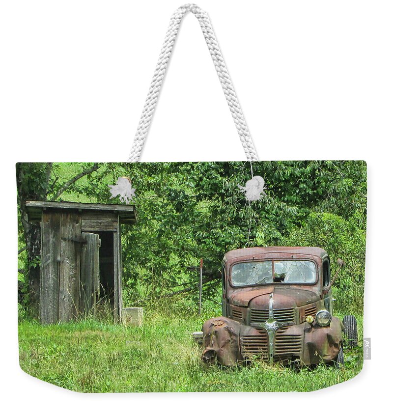 Victor Montgomery Weekender Tote Bag featuring the photograph One Eyed Jack by Vic Montgomery
