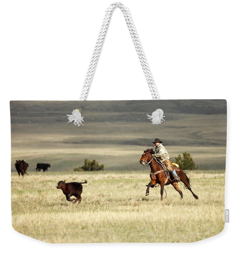 Calf Weekender Tote Bag featuring the photograph One Got Away by Todd Klassy