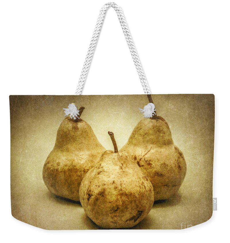 Pear Weekender Tote Bag featuring the photograph One Pair Too Many by Jorgo Photography