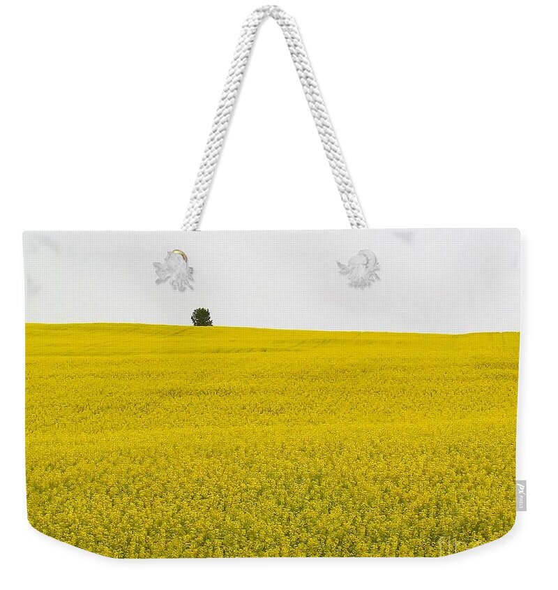 Photograph Weekender Tote Bag featuring the photograph One Tree Mustard Flower Fields by Delynn Addams