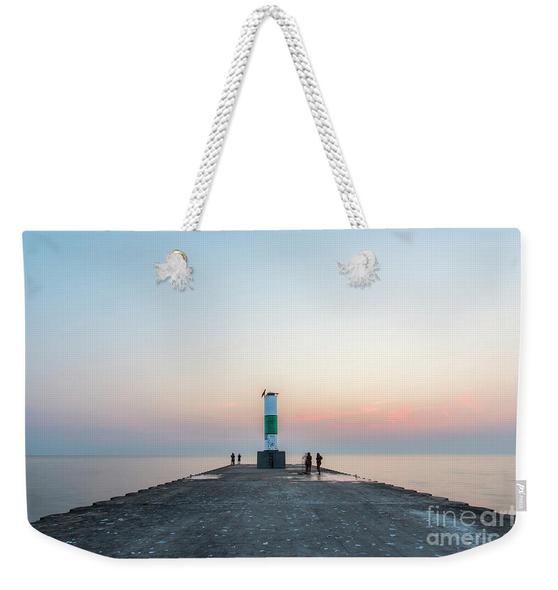 Onekama Weekender Tote Bag featuring the photograph Onekama Pier to Lake Michigan by Twenty Two North Photography
