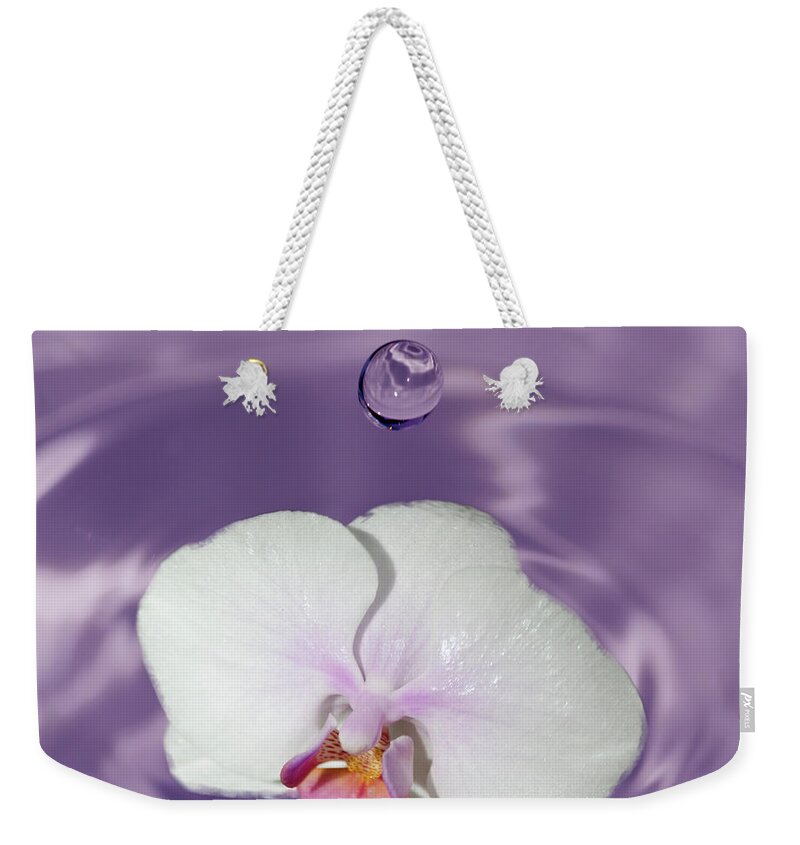 Macro Photography Weekender Tote Bag featuring the photograph White Orchid Water Drop by Crystal Wightman