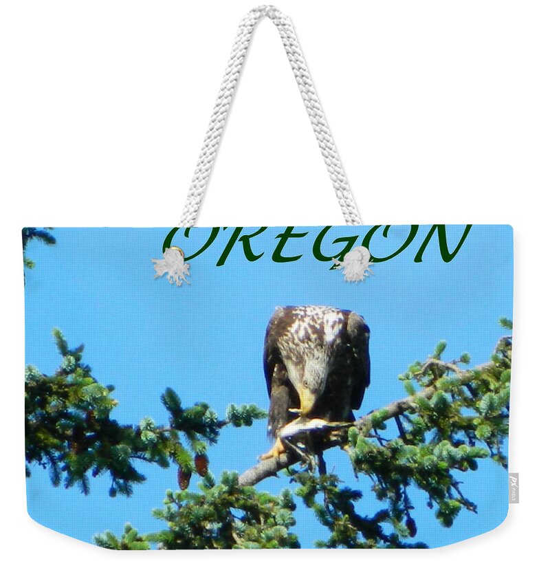 Eagles Weekender Tote Bag featuring the photograph OREGON Eagle Eating Prey by Gallery Of Hope 
