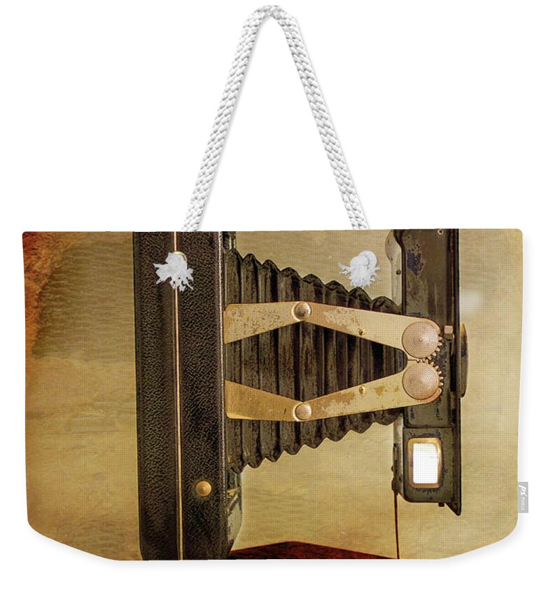 Cameras Weekender Tote Bag featuring the photograph Out Of Film by John Anderson