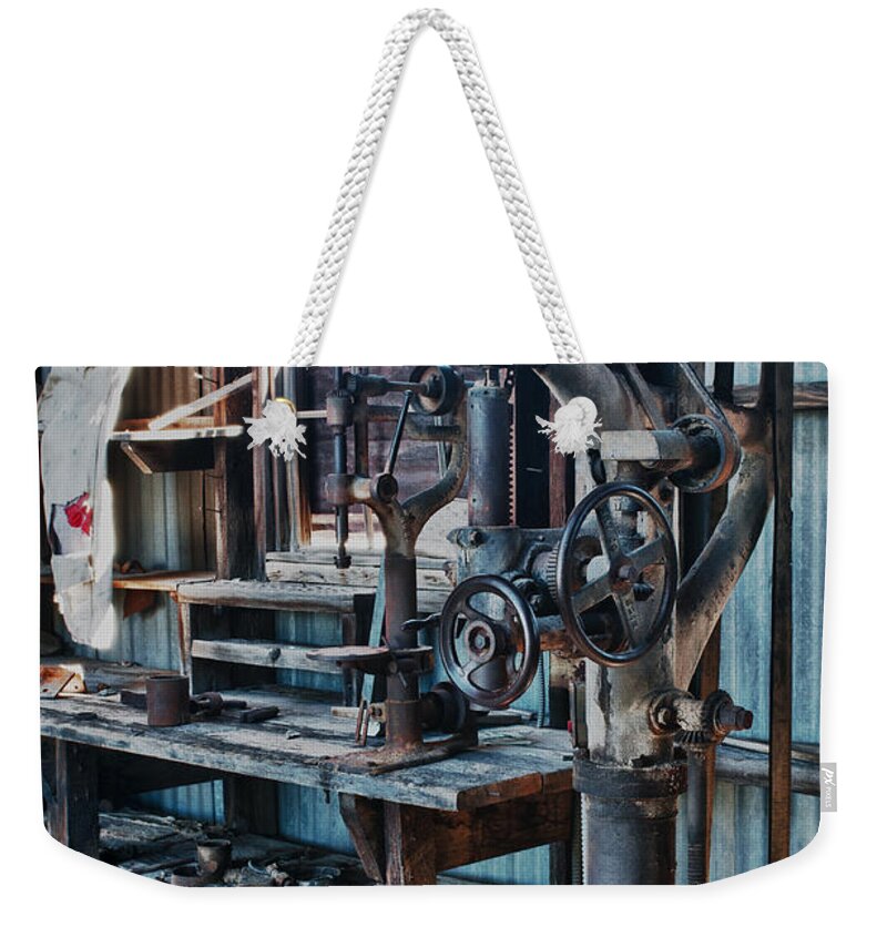 Odds & Ends Weekender Tote Bag featuring the photograph Out Of Work by Sandra Bronstein