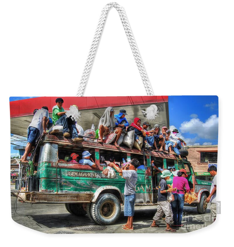 Yhun Suarez Weekender Tote Bag featuring the photograph Overload by Yhun Suarez