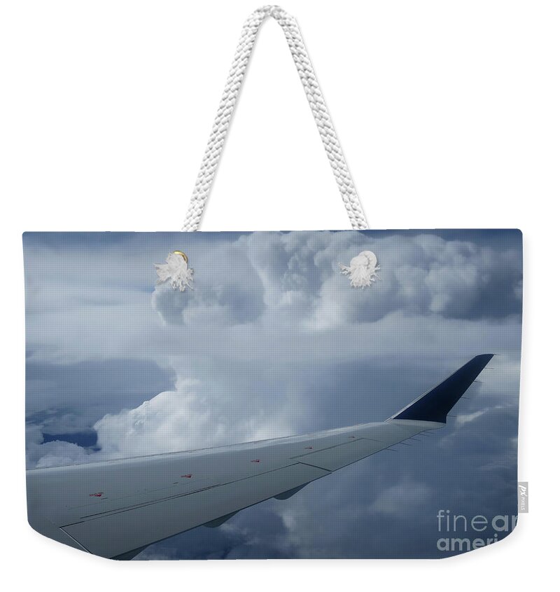 Cloudscape Weekender Tote Bag featuring the photograph Overseas Flight by Ann Horn