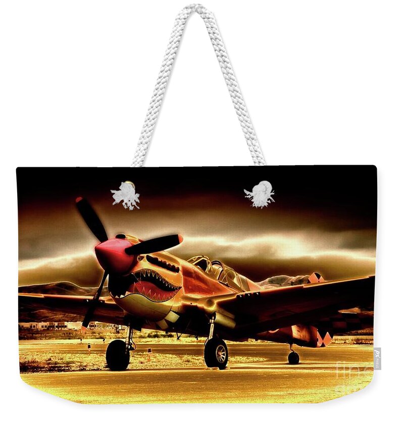 Transportation Weekender Tote Bag featuring the photograph P-40 Warhawk Blazrd by Gus McCrea