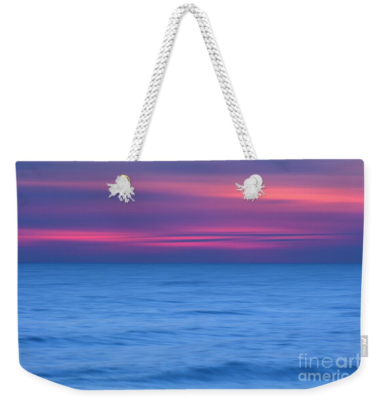 Beach Weekender Tote Bag featuring the photograph Painted shores by Marco Crupi