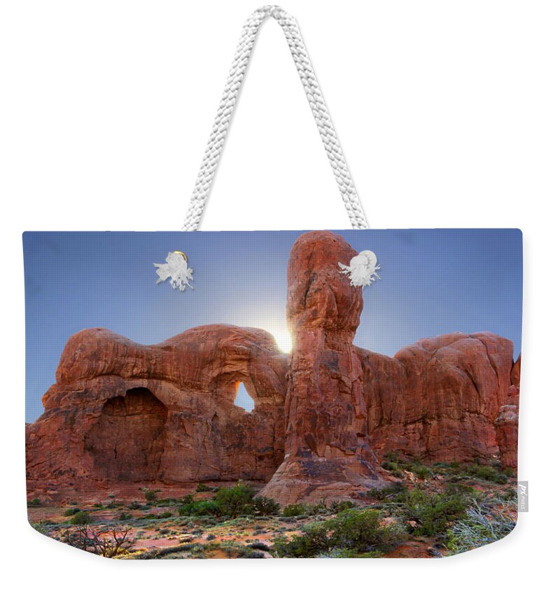 Desert Weekender Tote Bag featuring the photograph Parade of Elephants in Arches National Park by Mike McGlothlen