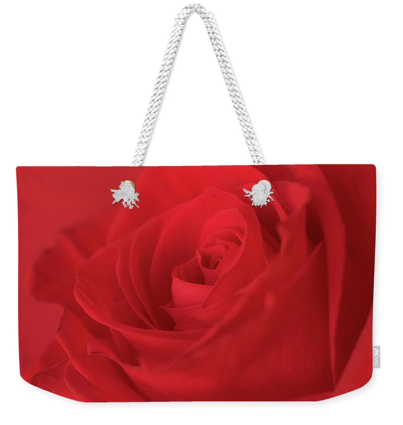 Red Rose Weekender Tote Bag featuring the photograph Passion by Holly Ross