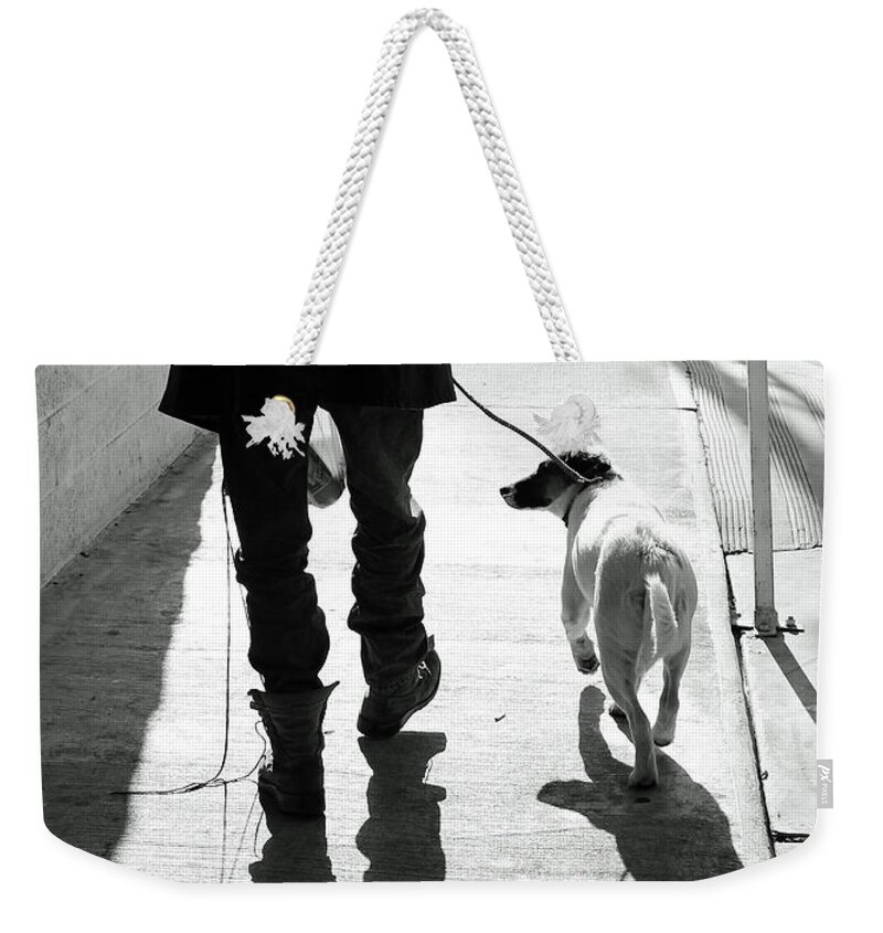 Black And White Photography By Joe Jake Pratt Weekender Tote Bag featuring the photograph Paul And Snowball by Joe Pratt