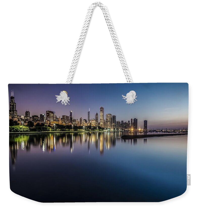Chicago Weekender Tote Bag featuring the photograph Peaceful summer dawn scene on Chicago's lakefront by Sven Brogren