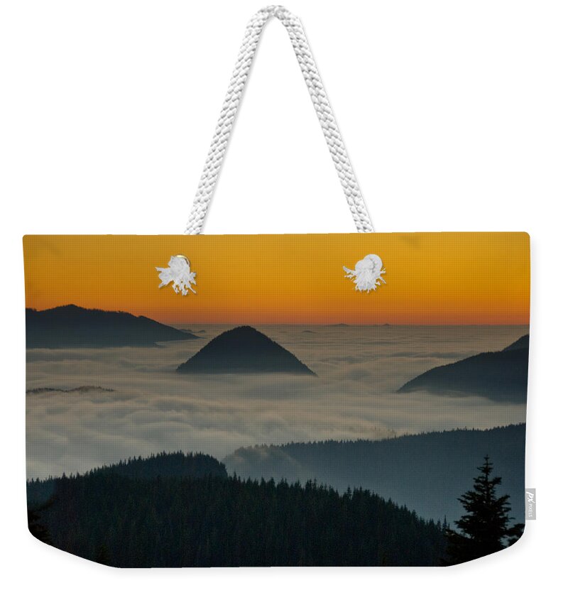 Beauty In Nature Weekender Tote Bag featuring the photograph Peaks Above the Fog at Sunset by Jeff Goulden