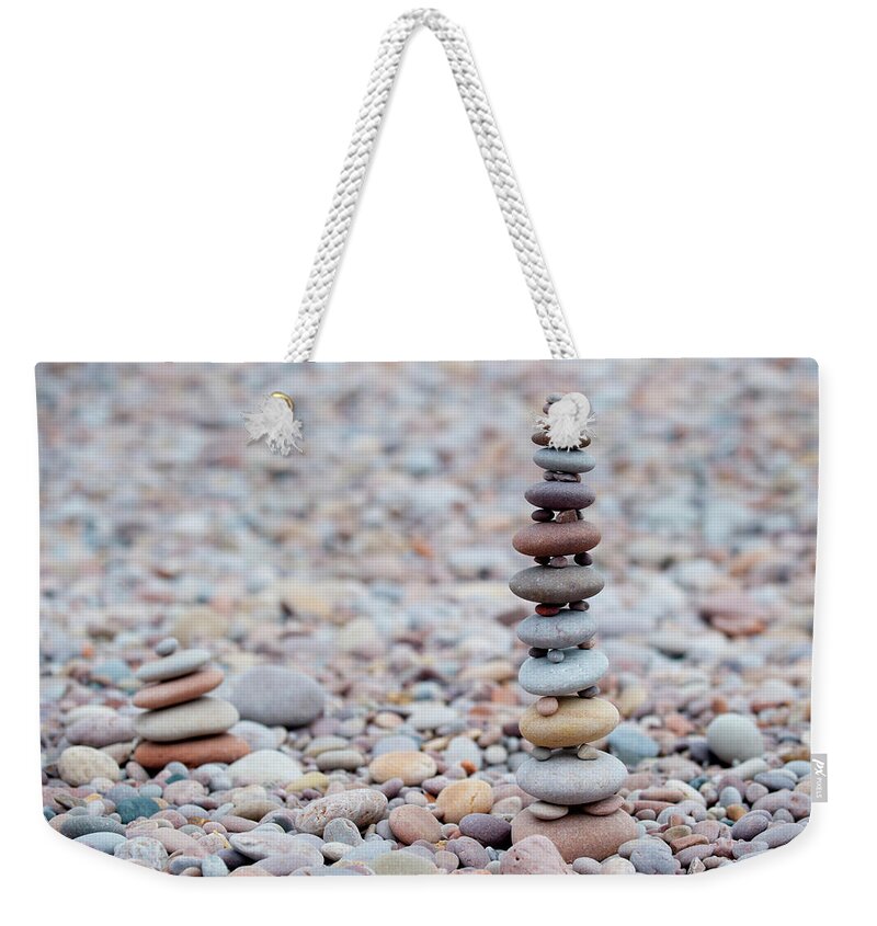 Beach Weekender Tote Bag featuring the photograph Pebble Stack ii by Helen Jackson