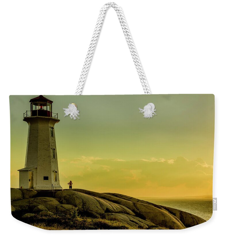 2016 Weekender Tote Bag featuring the photograph Peggys Cove Lighthouse at Sunset by Ken Morris