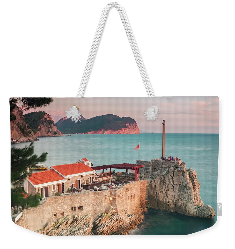Sunset Weekender Tote Bag featuring the photograph Petrovac fortress Montenegro by Sophie McAulay