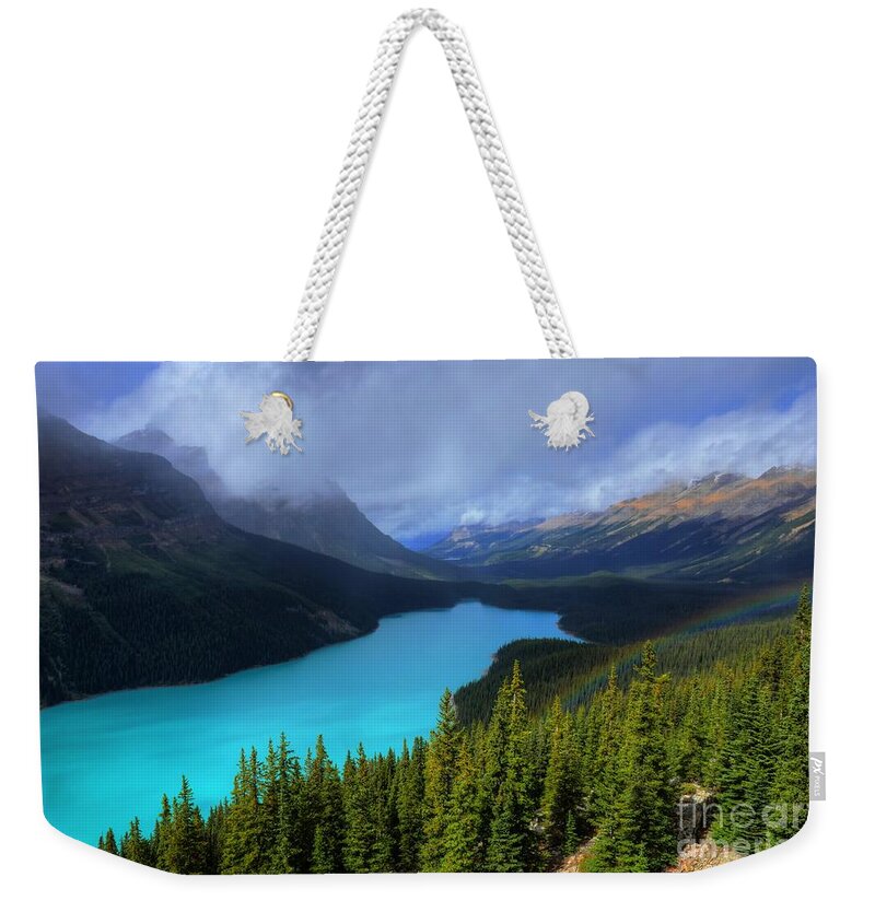 #photogtipsandtricks Weekender Tote Bag featuring the photograph Peyto Lake Rainbow Below Banff National Park by Wayne Moran