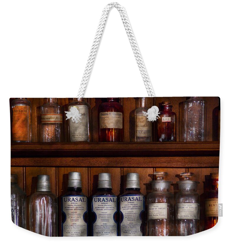 Savad Weekender Tote Bag featuring the photograph Pharmacy - Bonafide Cures by Mike Savad